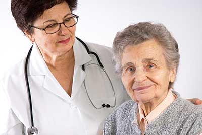 Doctor attending to patient at enTrust Immediate Care, Houston Urgent Care Center