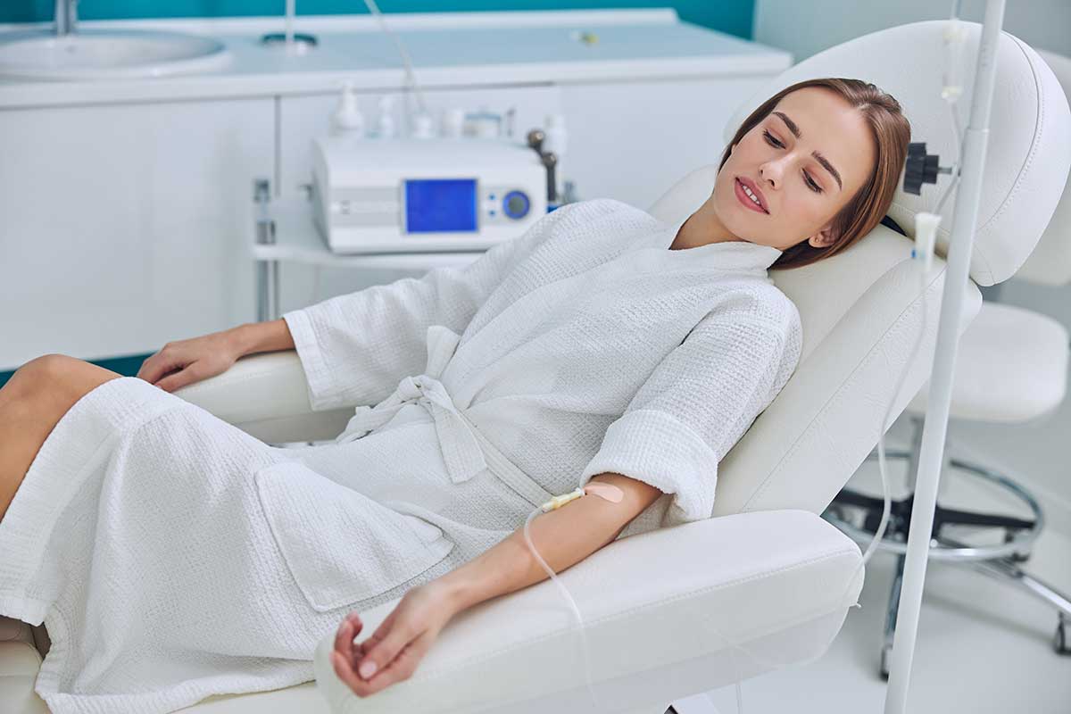 Lady undergoing IV Infusion Therapy at enTrust Immediate Care Center in Houston, TX